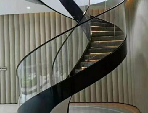 black steel beam glass railing staircase